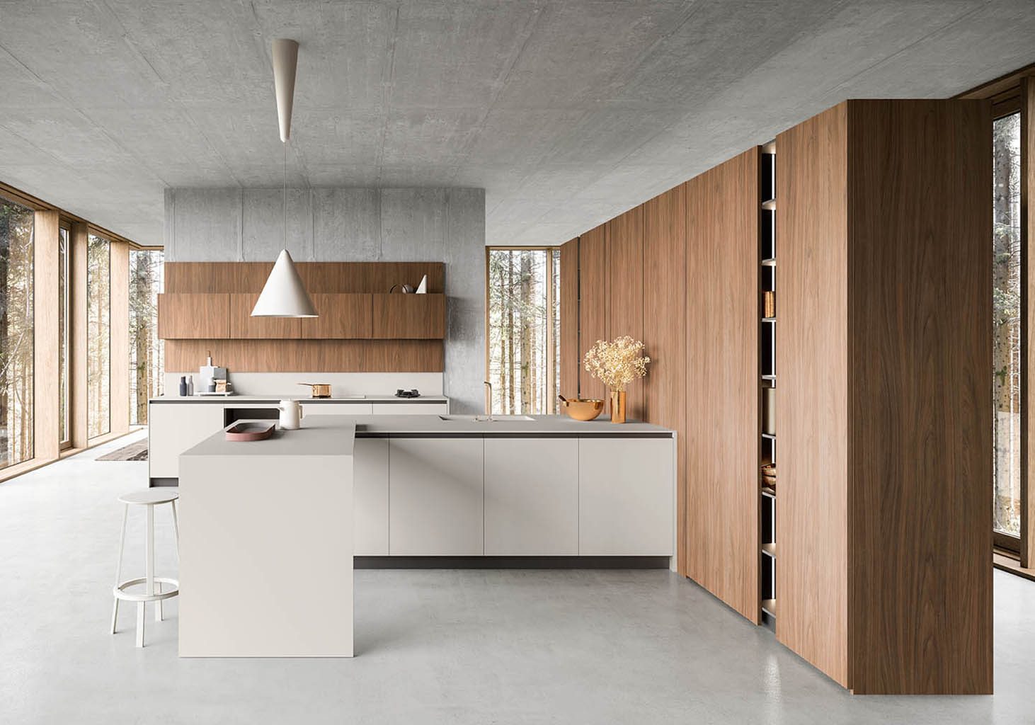 Cuisine Valdesign Anice, mur de rangements en noyer et îlot blanc